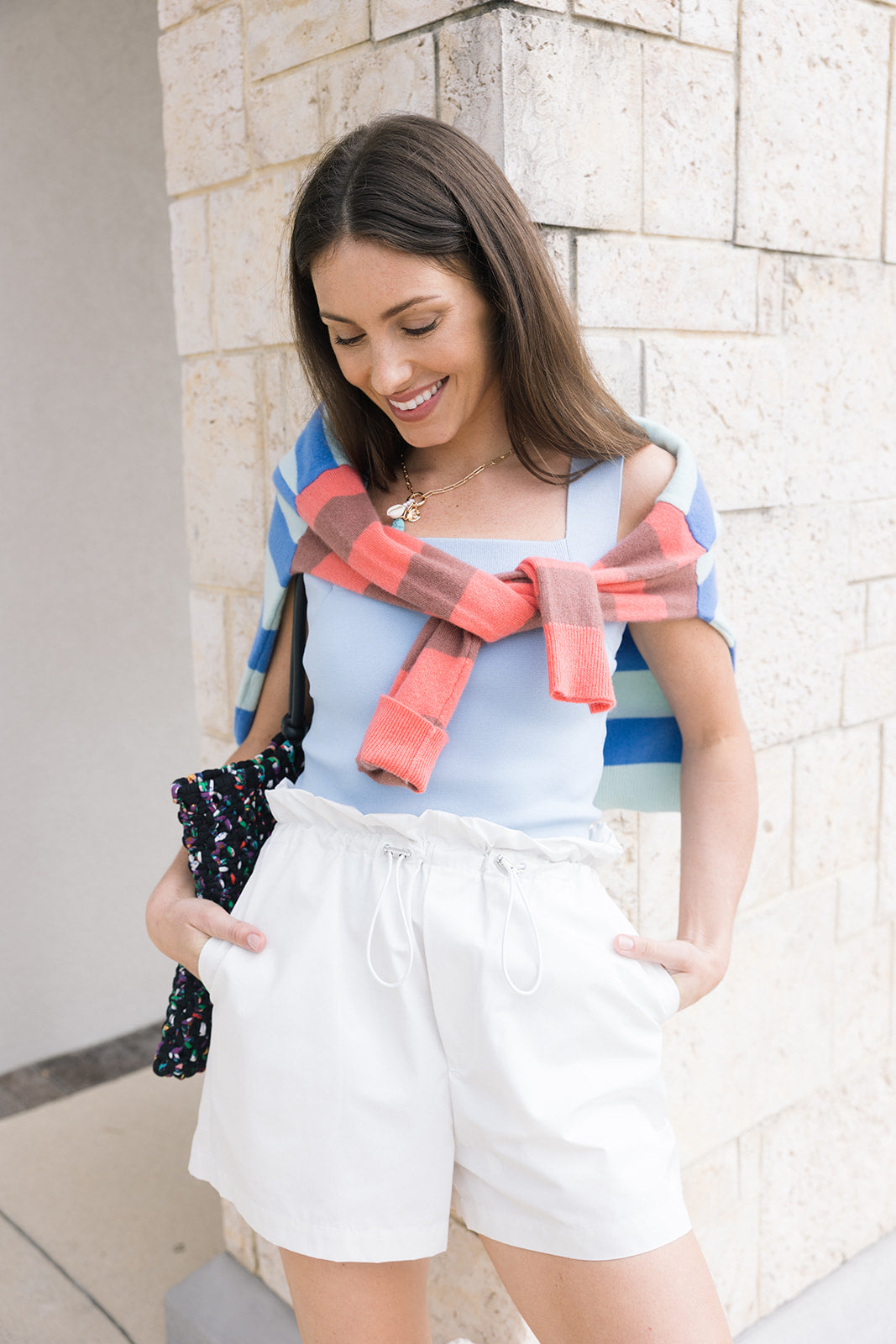 Lela Bluebird Stripe Sweater over shoulders, front view