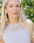 Claudia Necklace on model with blue dress