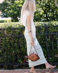 Connelly Stripe Midi Dress and Gwen Open Knit Top Ivory over shoulders, full body side