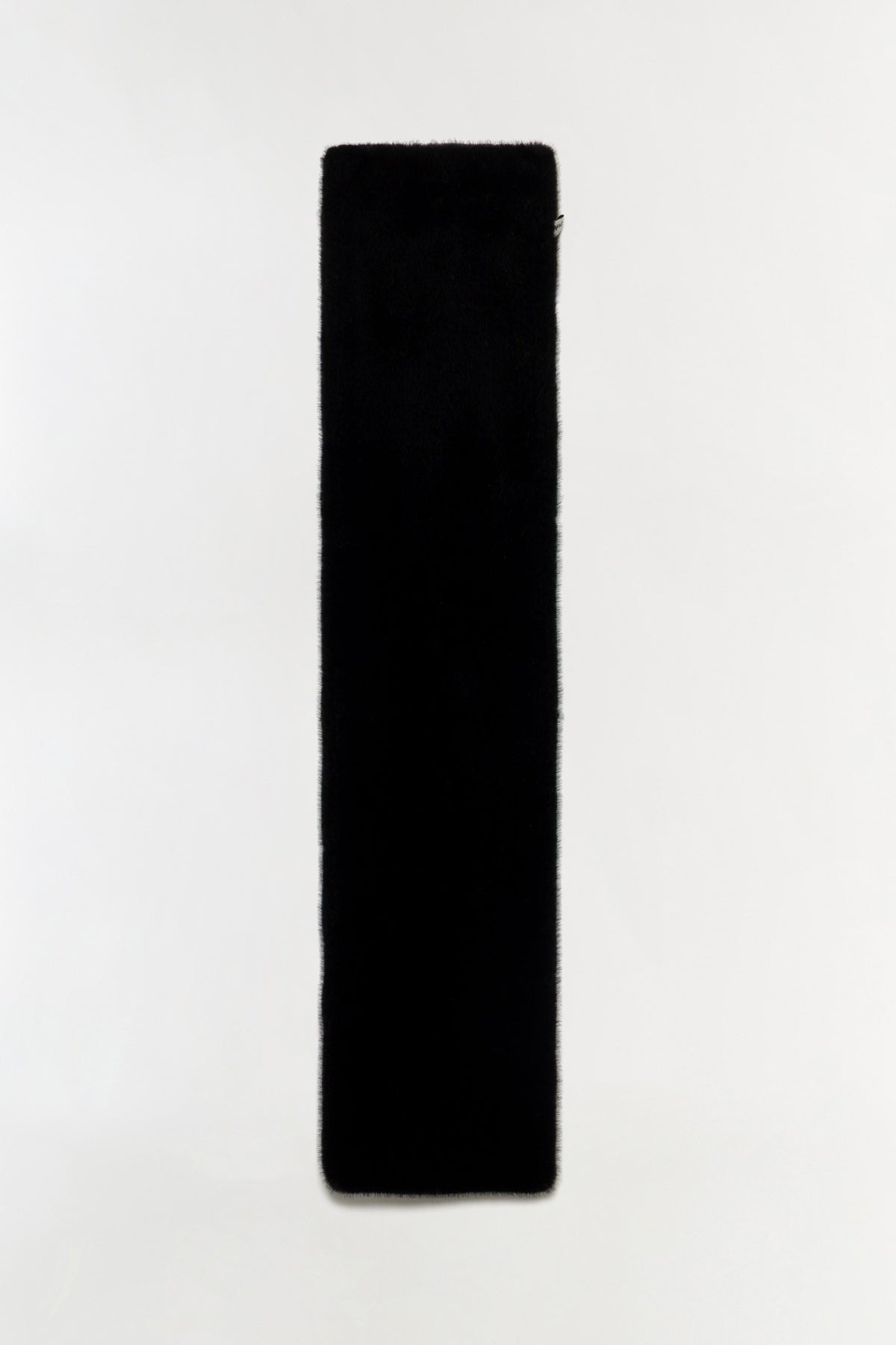 A long, narrow black fuzzy rectangular scarf, shown vertically against a plain white background.