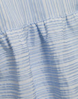 Close-up of a blue and white striped fabric texture