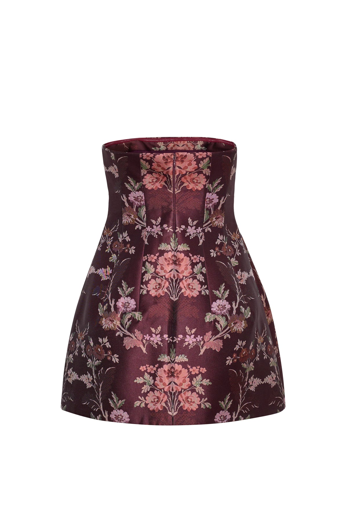 A strapless structured mini skirt in a deep burgundy brocade fabric with an intricate floral pattern in pink, red, and green, shown against a plain white background.