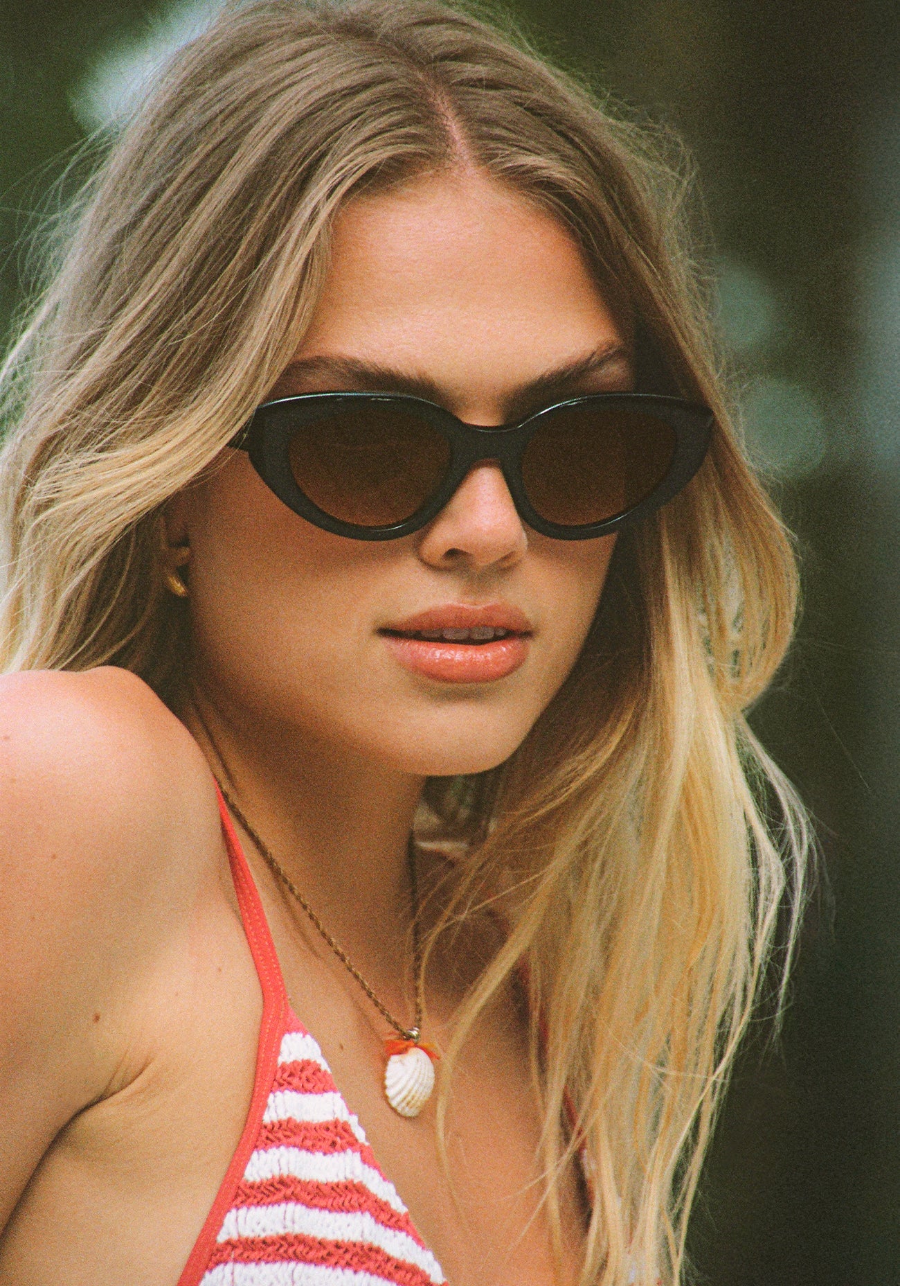 Irene Black + Black Crystal Sunglasses on model with average square/rectangle face shape