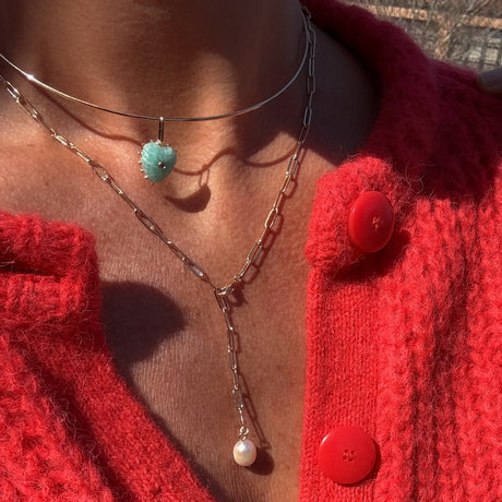 Lea Pearl Lariat Necklace front view on model paired with a heart choker necklace