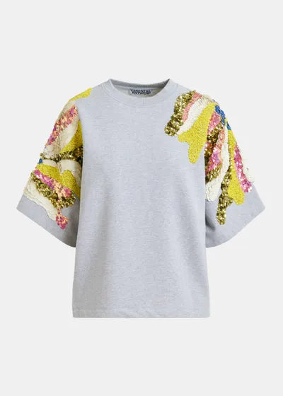 Gray sweater with colorful floral sleeves on a white background
