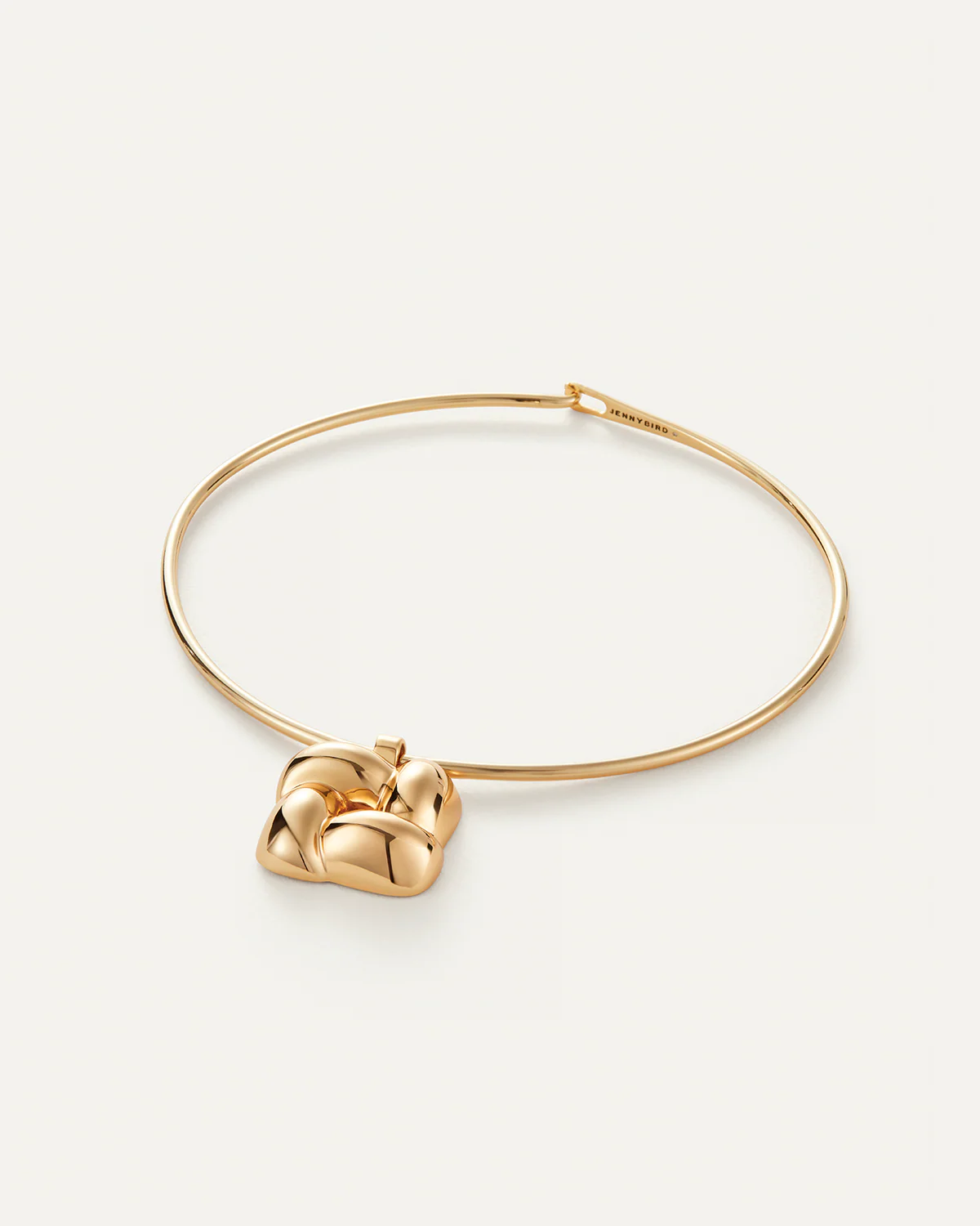Gold necklace on a white background