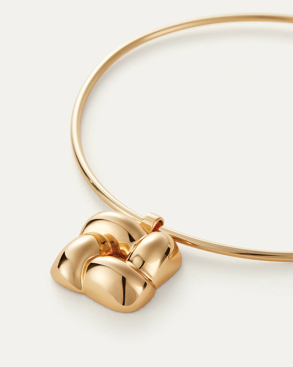 Gold necklace on a white background