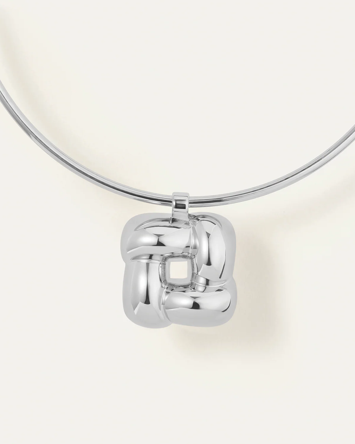 Chrome wall-mounted light fixture on a white background