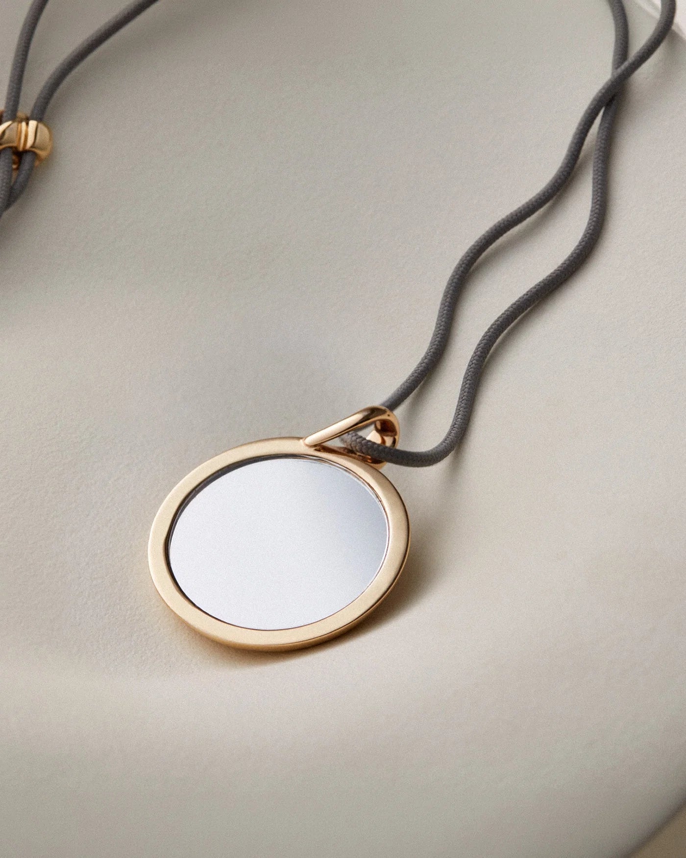 nico mirror pendant neckalce, back 