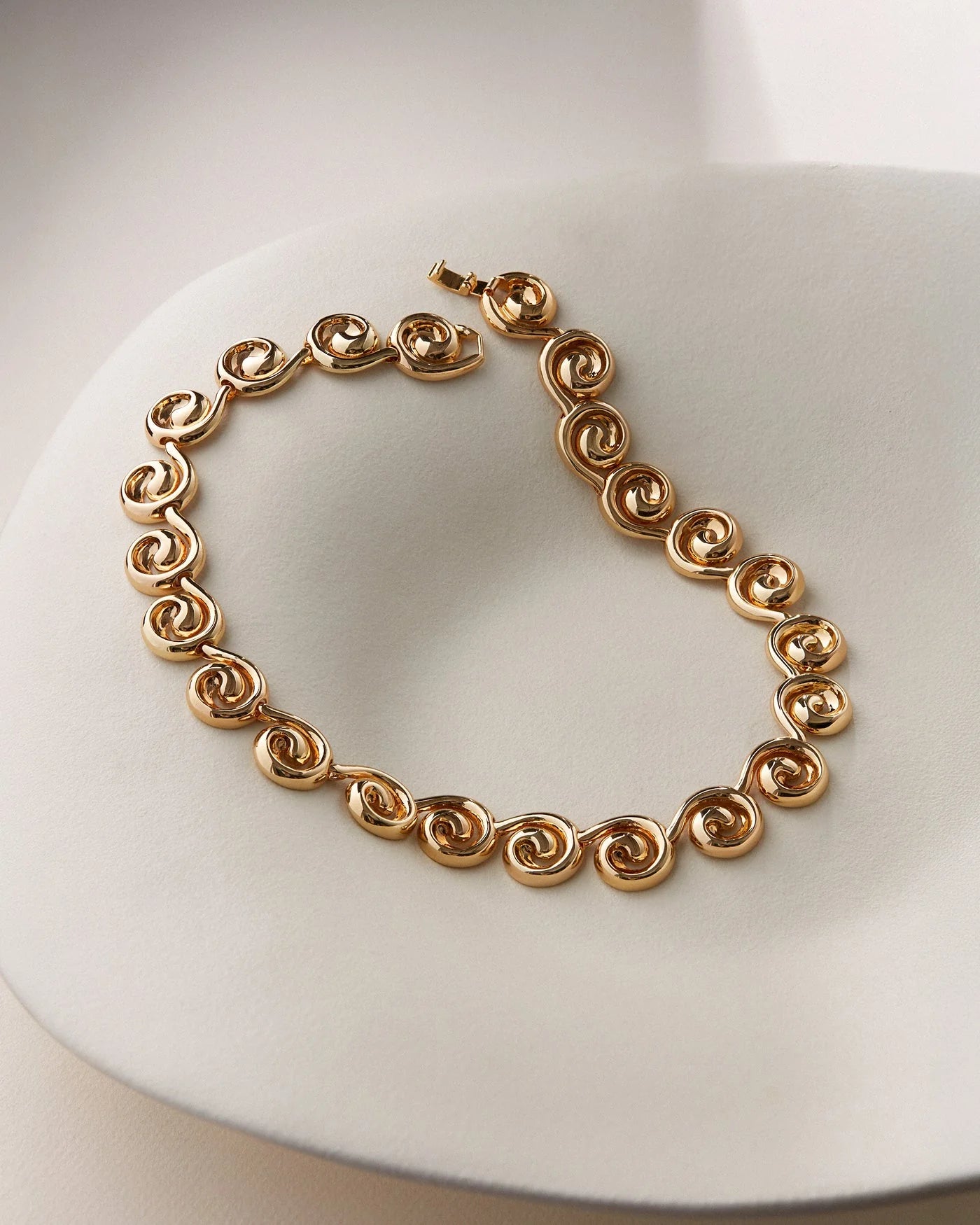 nico collar necklace on a cream background