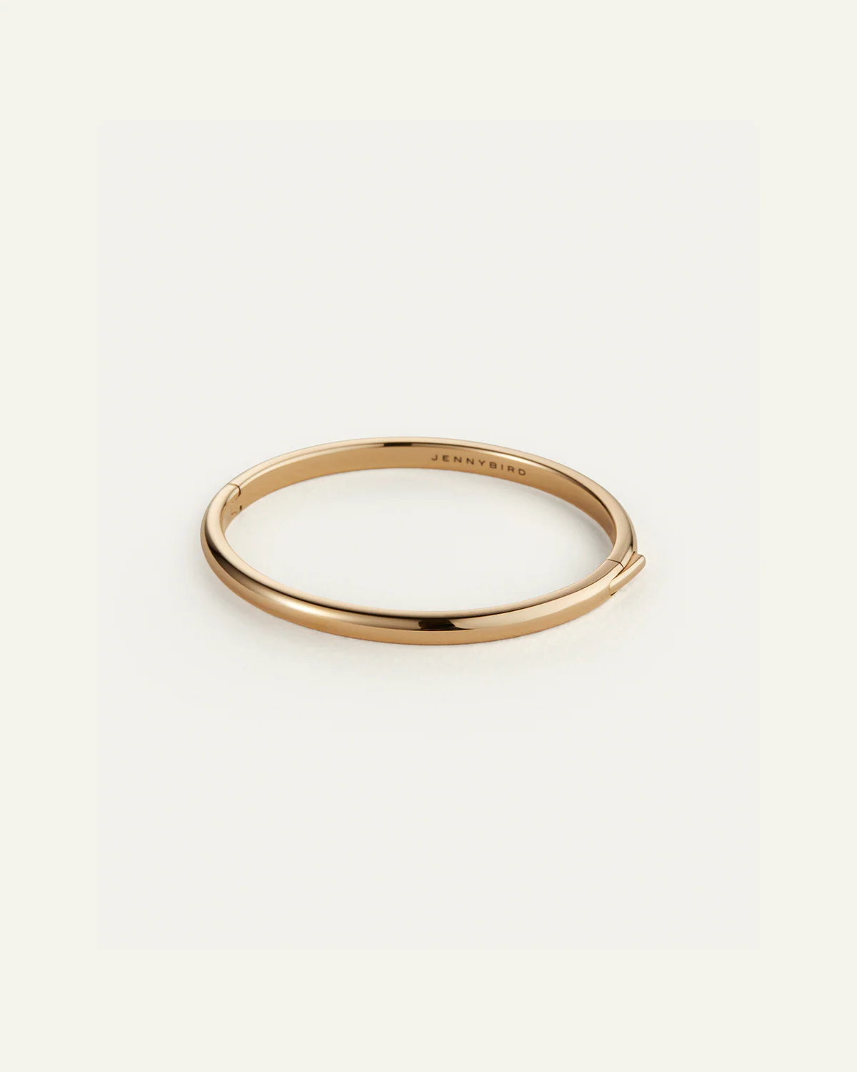 Gold bracelet on a white background