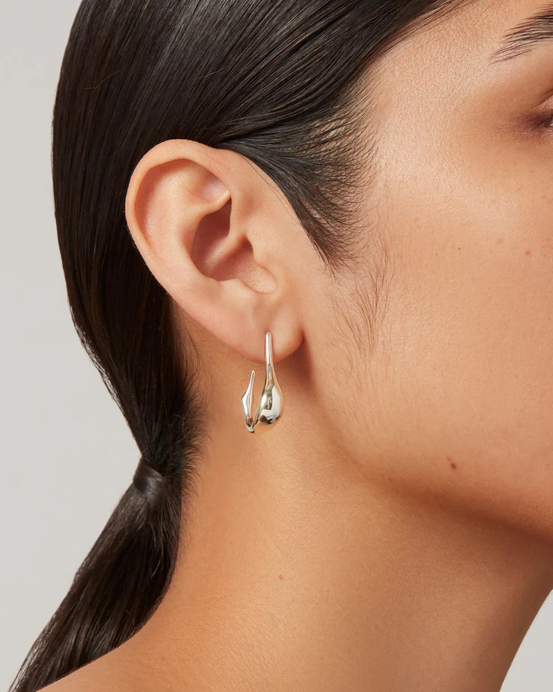 Colette Hoops Small in Silver close up side view on model
