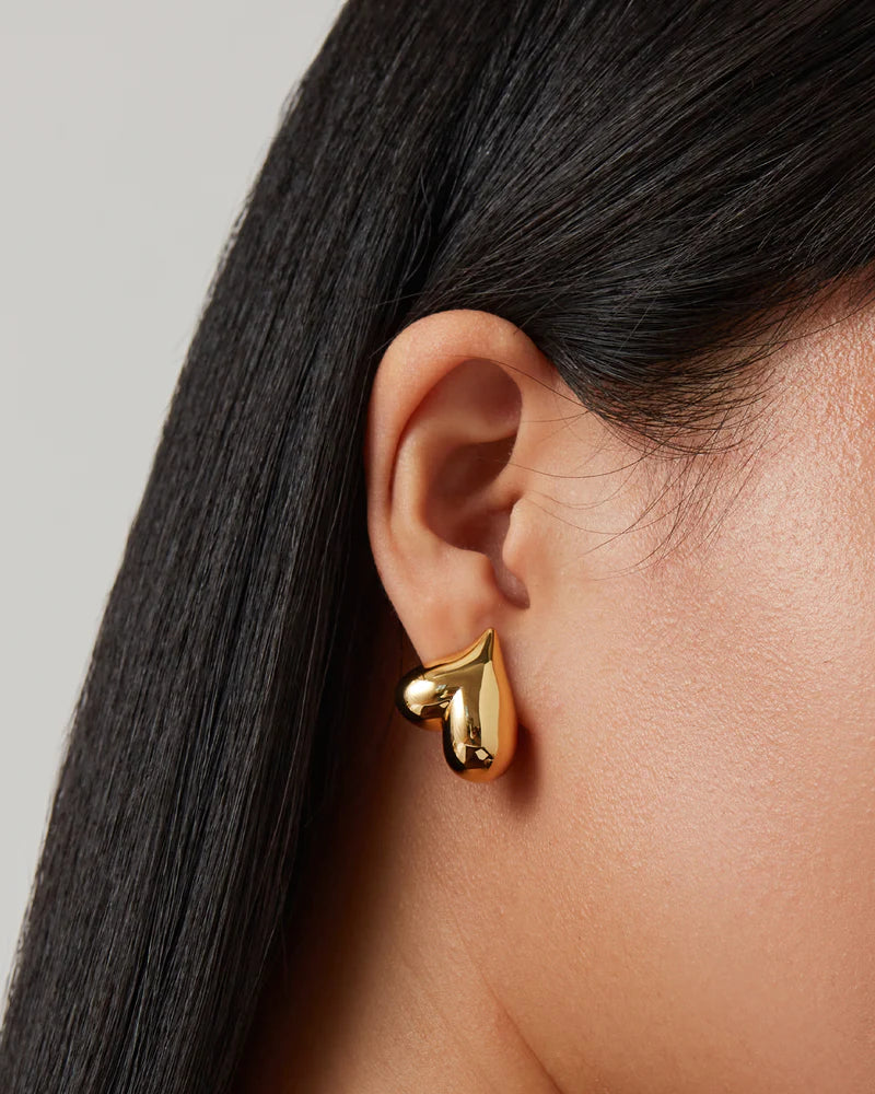 Art Heart Button Earrings Gold on model, upside down