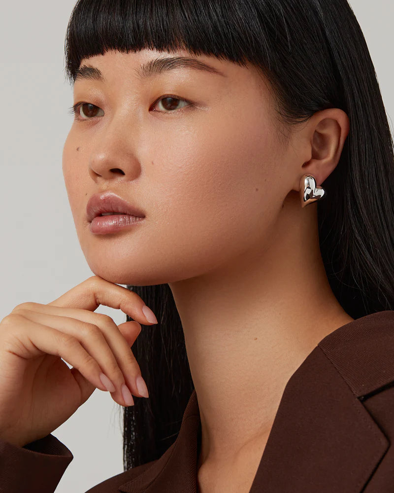 Art Heart Button Earrings on model