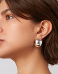 Gemma Hoops in Silver side view on model