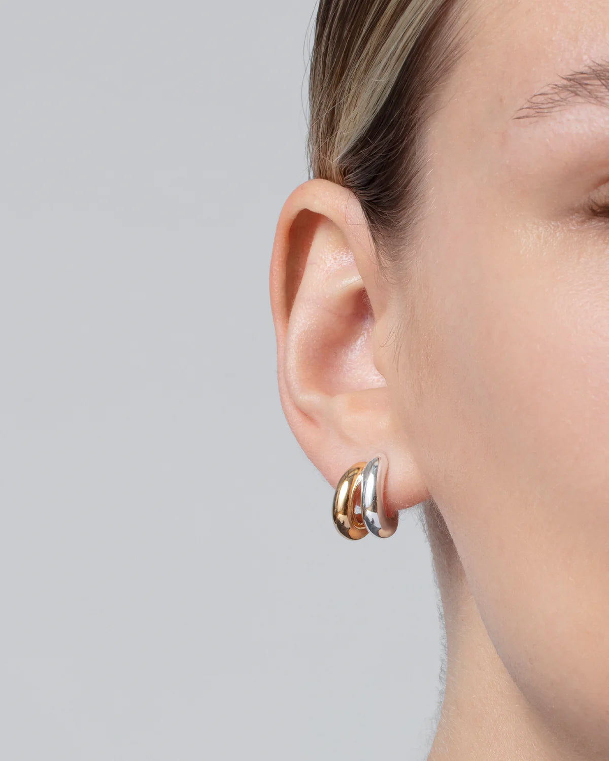 Mini Florence Earrings close up on ear
