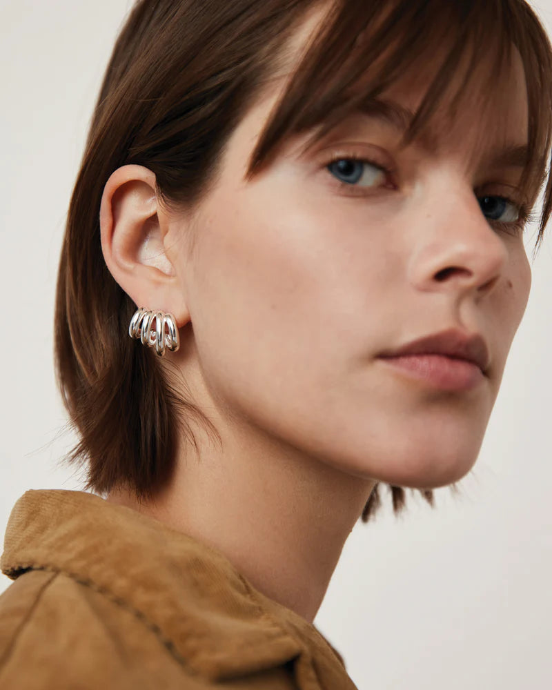 Monroe Earrings in Silver side view on model