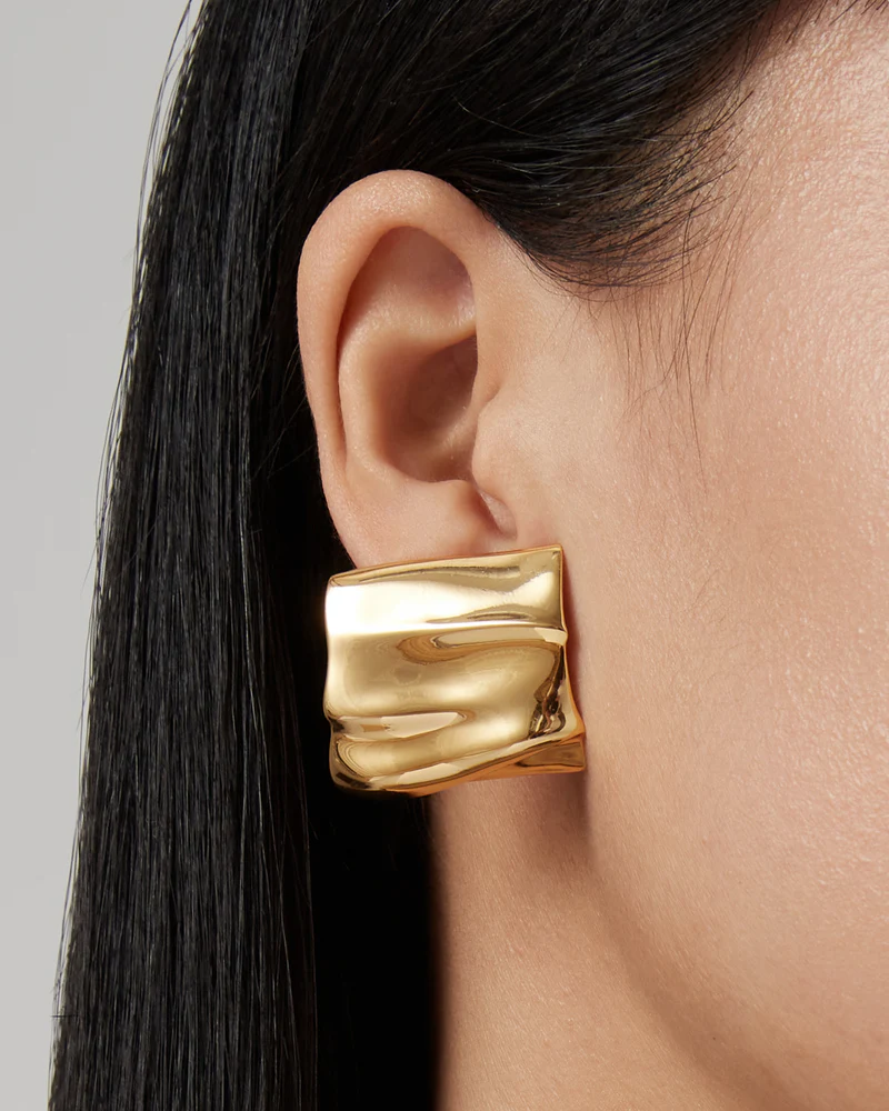 Sundra Earrings Gold on ear