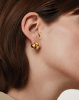 Beatrix Earrings side view on model