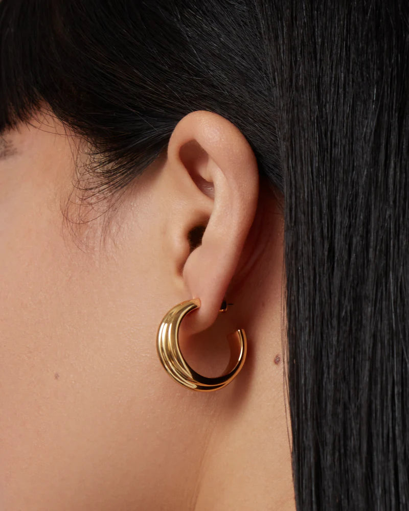 Lennon Hoops in Gold close up side view on model
