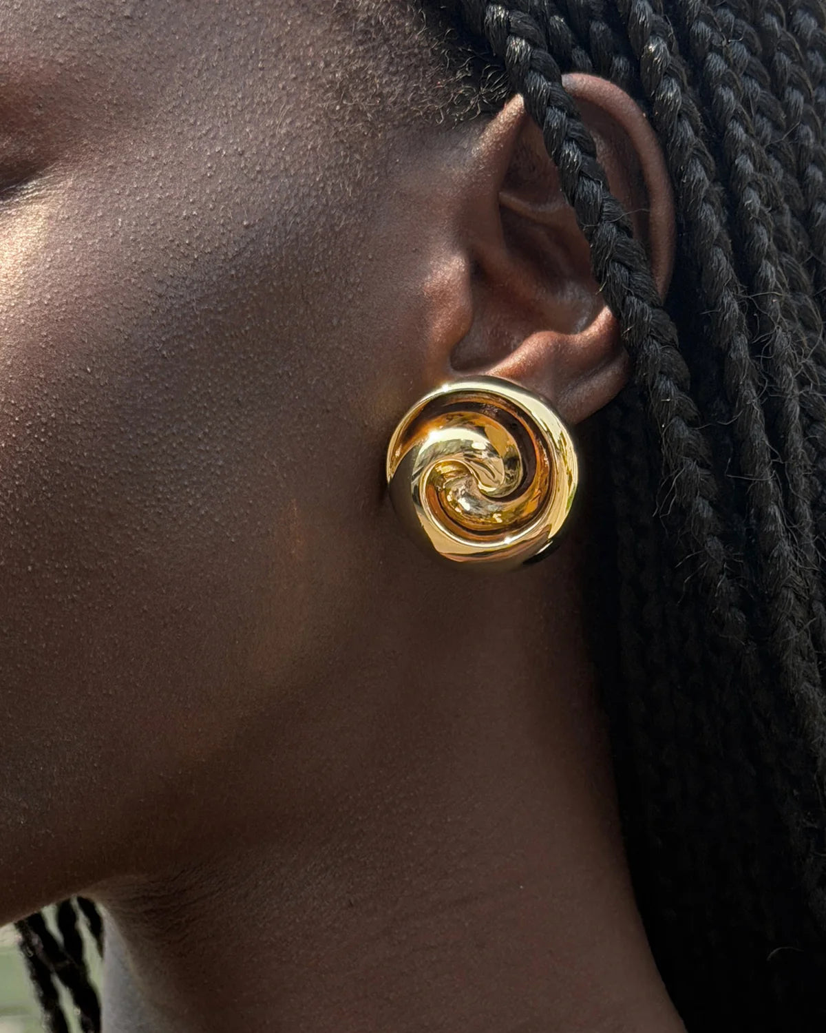 Renzo Earrings close up on model