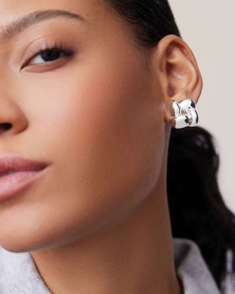Small Woven Square Earrings in Silver front view on model