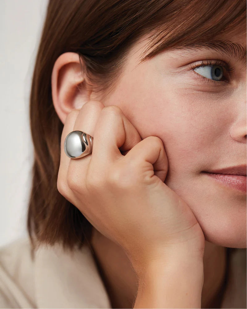 Nelle Ring in Silver Size 4 front view on model's finger