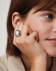 Nelle Ring in Silver Size 4 front view on model's finger