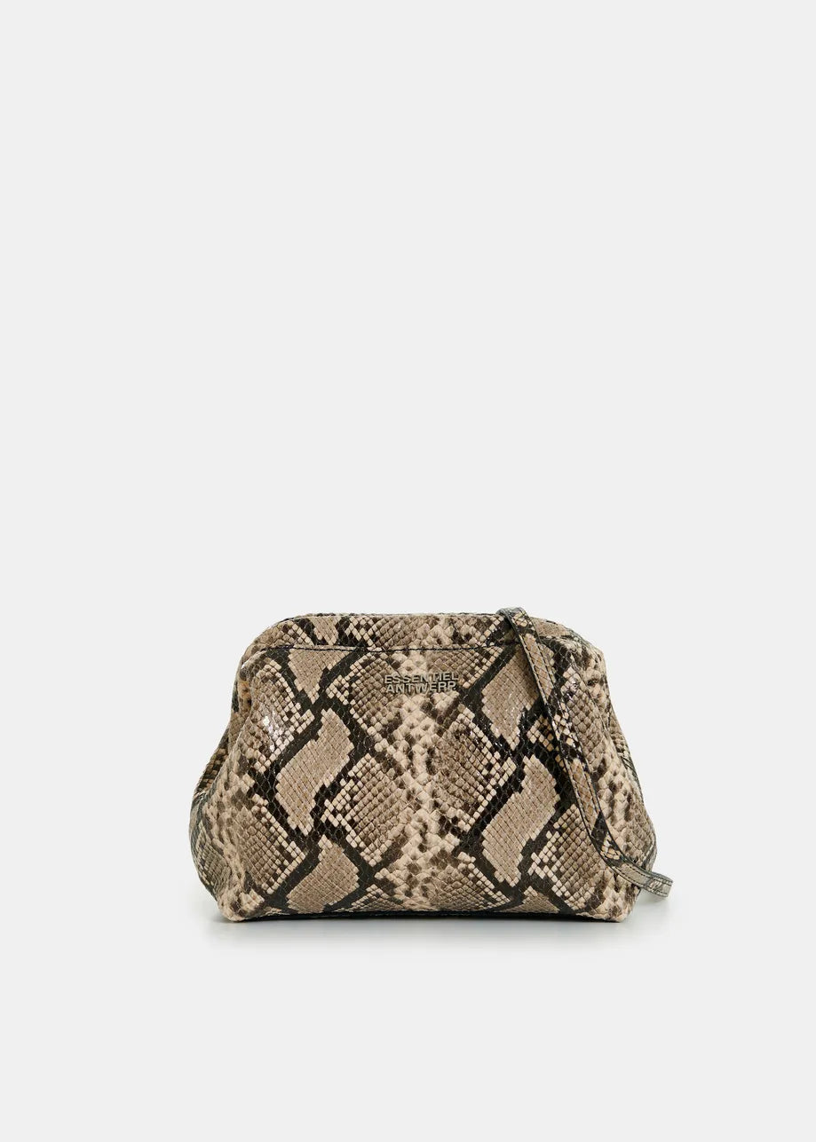 Snakeskin patterned handbag on a light beige background