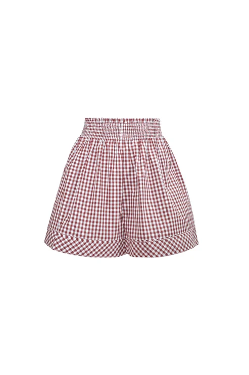 Red and white gingham patterned shorts with a smocked elastic waistband, shown against a plain white background.