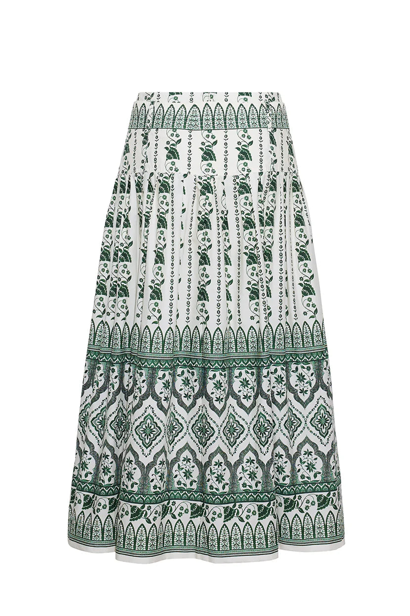 Green and white patterned skirt on a white background