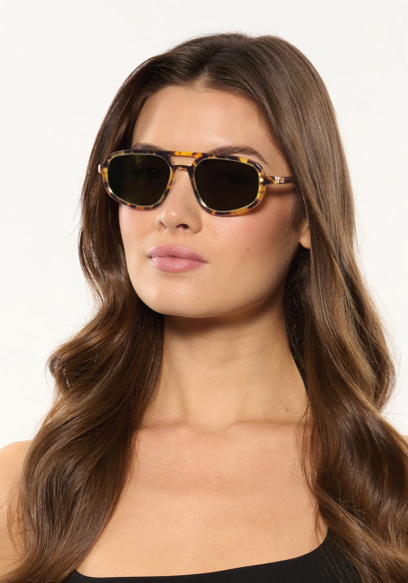 Jordan Sunglasses Nikko Tortoise + 12K Polarized on model with average, oval face shape