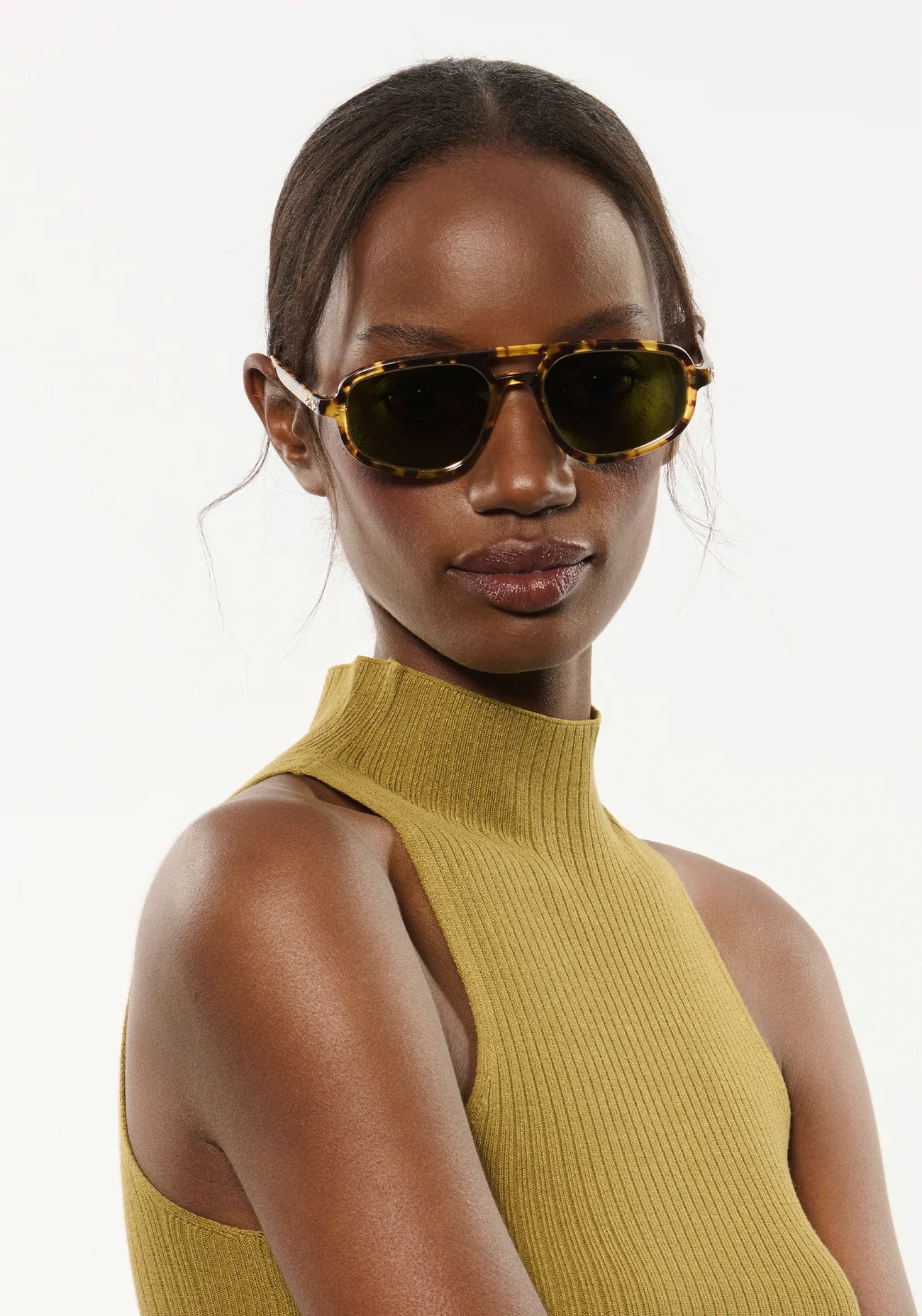 Jordan Sunglasses Nikko Tortoise + 12K Polarized on model with narrow, oval face shape