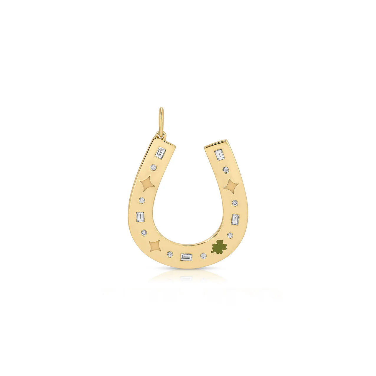Gold horseshoe pendant with stars and a clover on a white background