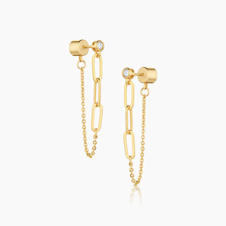 Gold chain earrings on a white background