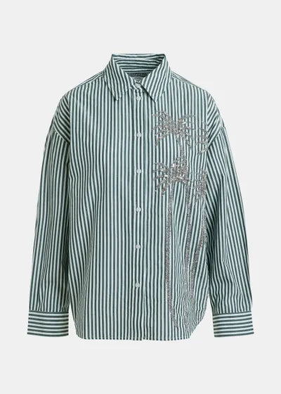 Green and white striped shirt with decorative elements on a light gray background