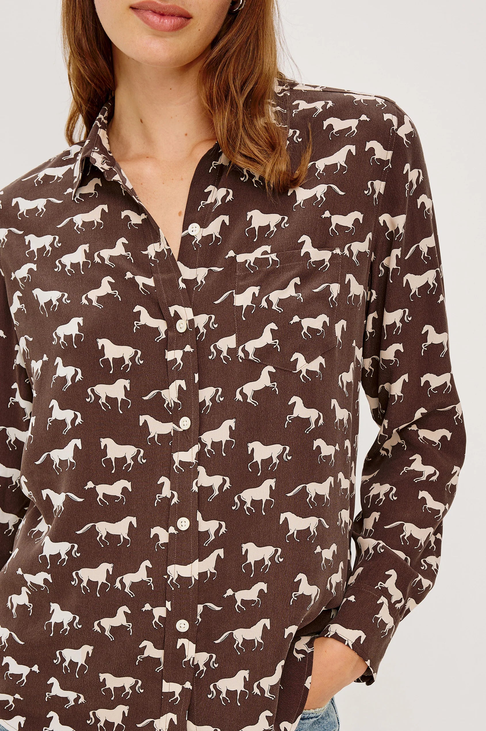 Woman modeling horse printed silk shirt front view
