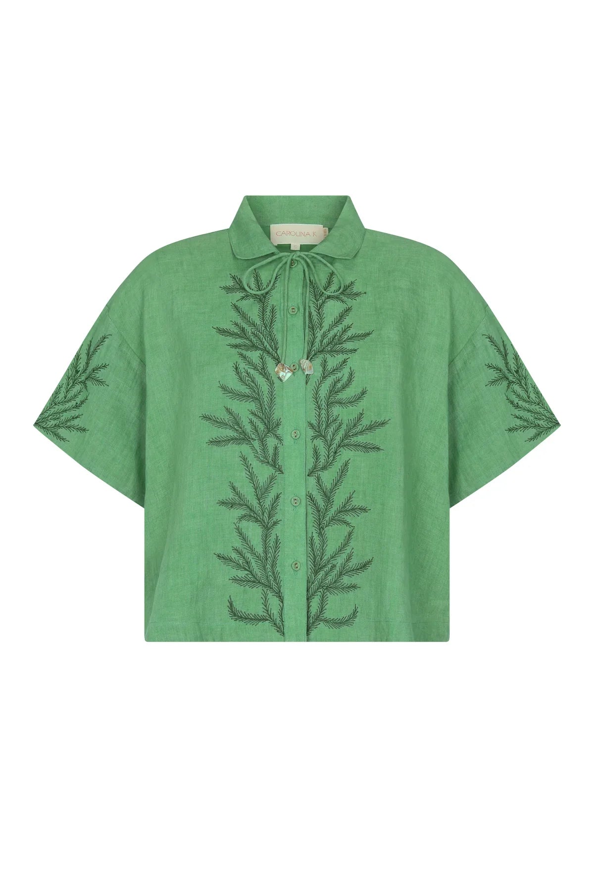 A green short-sleeve button-up shirt with a tie collar and dark green embroidered leaf patterns on the front and sleeves, shown against a plain white background.