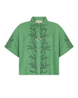 A green short-sleeve button-up shirt with a tie collar and dark green embroidered leaf patterns on the front and sleeves, shown against a plain white background.