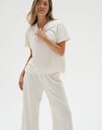 Ava Oversized Spandex Jersey Tee front view on model with white background 