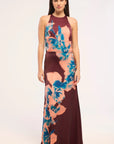 Woman wearing a floral dress with a white background