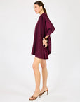 Elizabeth Romper side view on model with cape