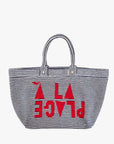 Striped tote bag with red text on a white background