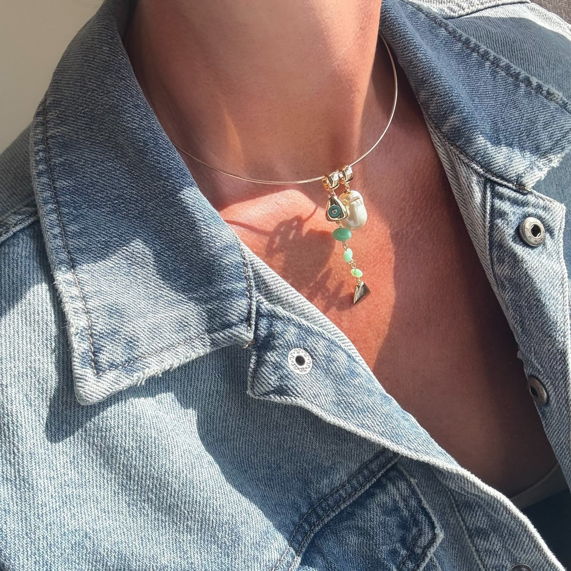 La Pez Chrysoprase Fish Bail on necklace with another charm next to it