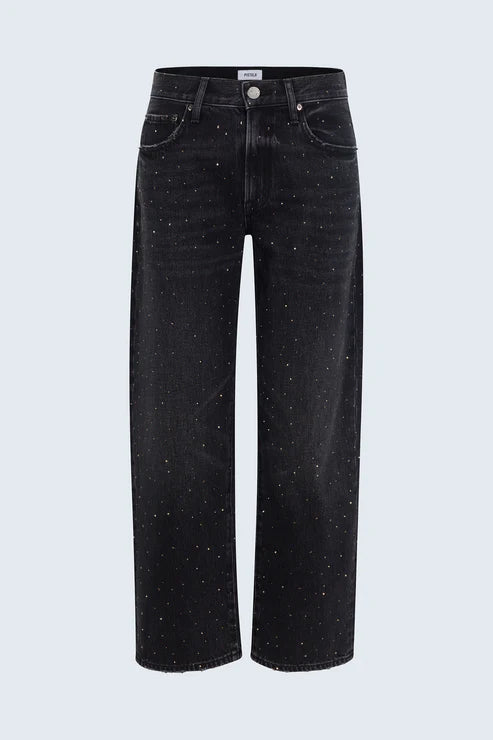 Black jeans with speckled pattern on a light gray background