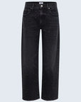 Black jeans with speckled pattern on a light gray background