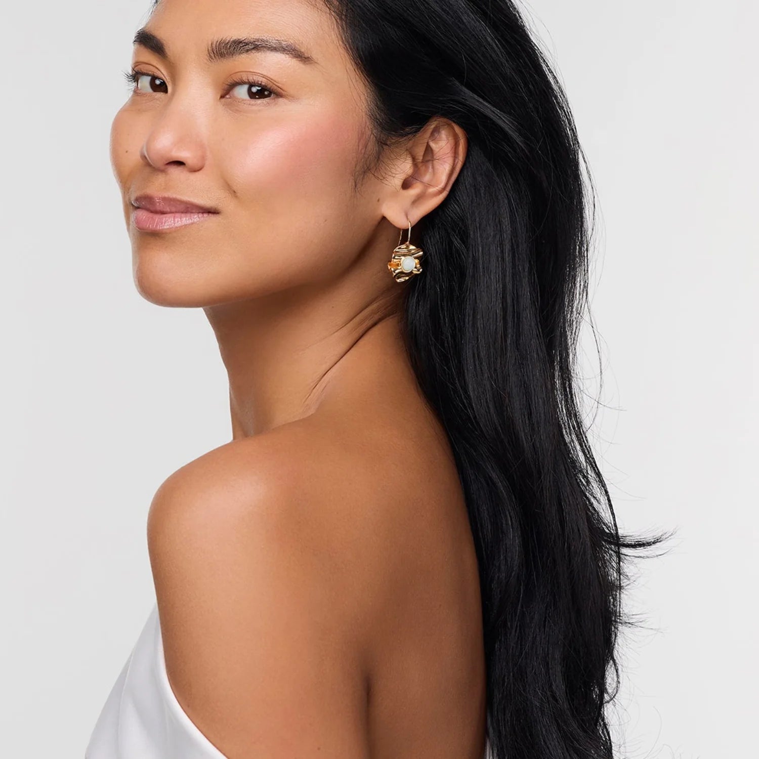 Linda Earrings on ear