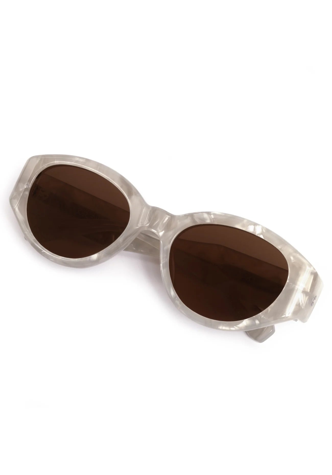 Sunglasses with brown lenses and silver frame on a white background