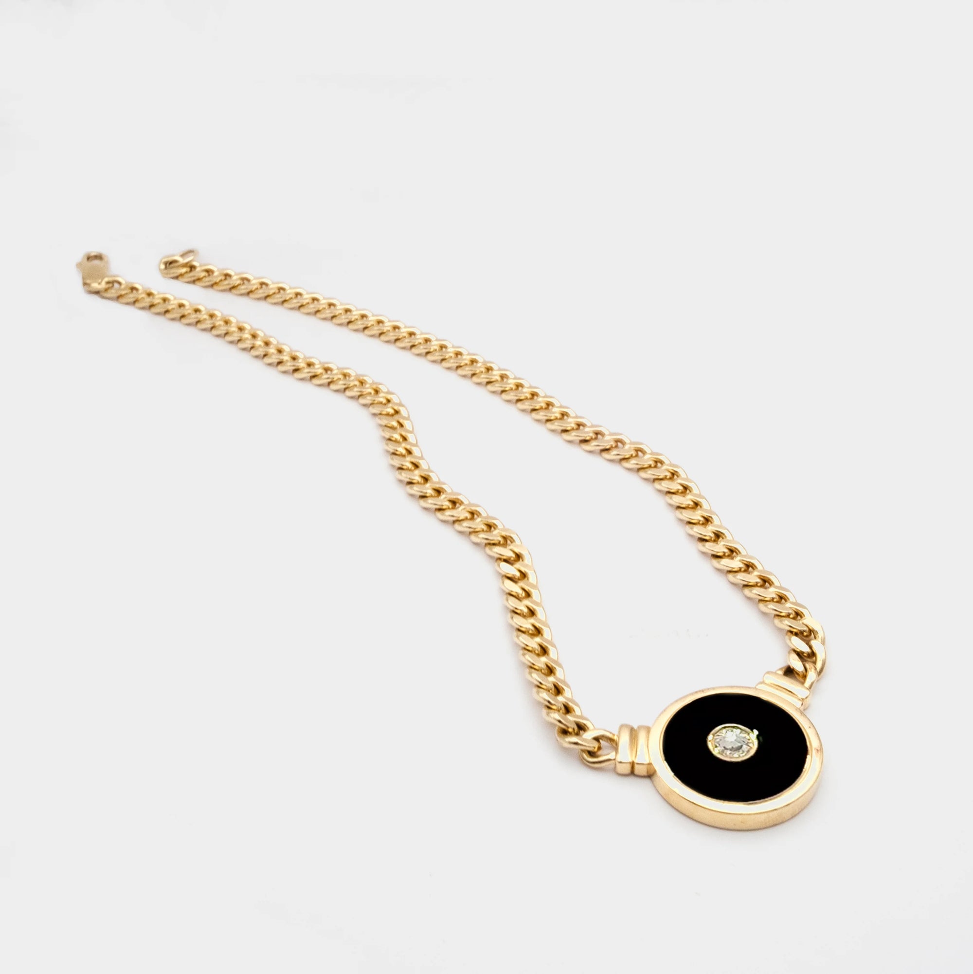Luna Nera Pendant Necklace laid flat