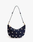 Navy blue handbag with silver studs on a white background